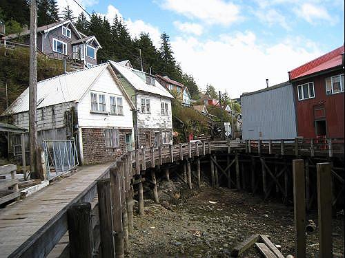 05-ketchikan_historic_homes_on pile-ons.jpg - Here is a back street we discovered on the free self-guided Ketchikan Walking Tour.  Water Street is an original Ketchikan streets and shows how those early settlers dealt with the challenge of finding a place to build.  High tide brings salt water lapping the bottom of the pier.